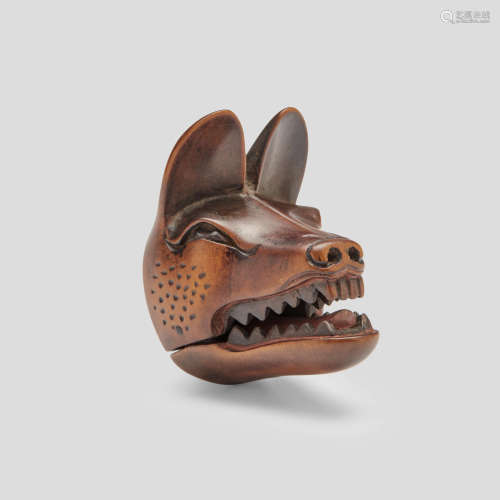 Deme Uman (active early 19th century) A wood mask netsuke of fox Edo period (1615-1868), early 19th century