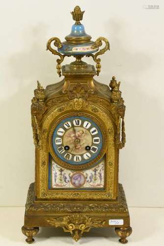 Pendule Napoléon III en bronze doré et porcelaine …