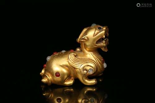 A Tibetan Bronze Gilding Beast Ornament