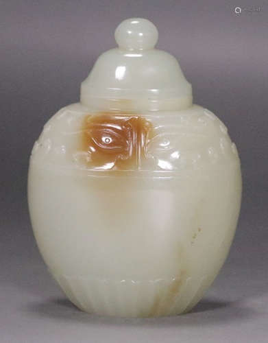 A HETIAN JADE VASE CARVED WITH BEAST PATTERN