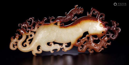 AN ANTIQUE JADE TIGER PENDANT