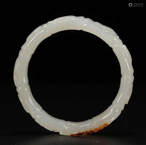 A HETIAN JADE BANGLE CARVED WITH BAMBOO