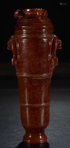 AN ANTIQUE JADE CUP CARVED WITH BEAST PATTERN