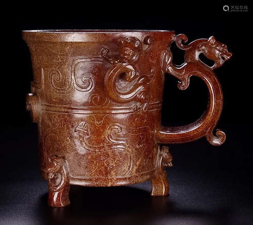 AN ANTIQUE JADE CUP CARVED WITH BEAST