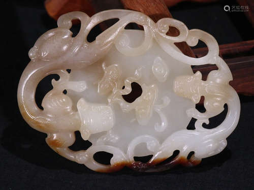 A HETIAN JADE BI CARVED WITH BEAST