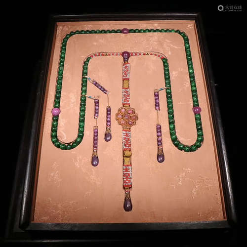 A JADEITE STRING NECKLACE WITH 108 BEADS