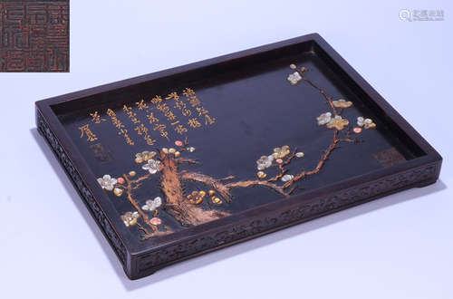 A ZITAN WOOD PLATE EMBEDDED WITH GEM