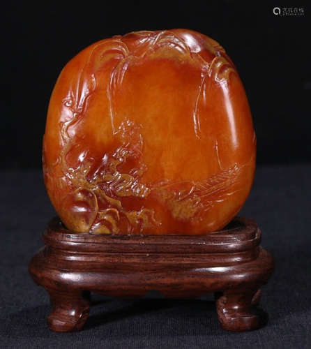 A TIANHUANG STONE PENDANT CARVED WITH LANDSCAPE