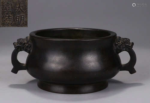 A COPPER CENSER WITH BEAST EARS