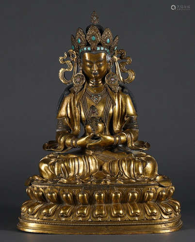 A GILT BRONZE LONGEVITY BUDDHA STATUE