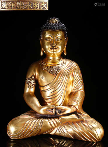 A GILT BRONZE SAKYAMUNI BUDDHA STATUE