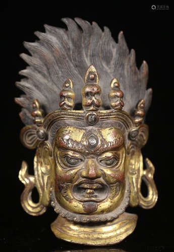 A GILT BRONZE MAHAKALA BUDDHA HEAD