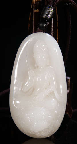 A HETIAN JADE PENDANT CARVED WITH MANJUSRI BUDDHA