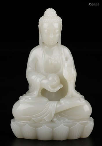 A HETIAN WHITE JADE SAKYAMUNI BUDDHA STATUE