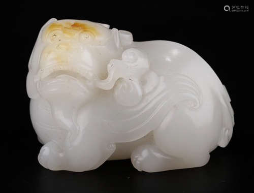 A HETIAN WHITE JADE BEAST PENDANT