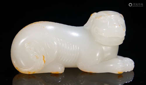 A HETIAN JADE BEAST PENDANT