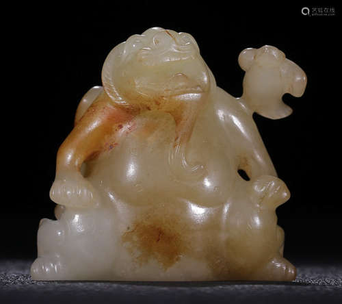 A HETIAN WHITE JADE BEAST PENDANT