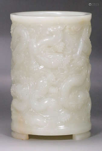 A HETIAN JADE BRUSH POT CARVED WITH DRAGON PATTERN