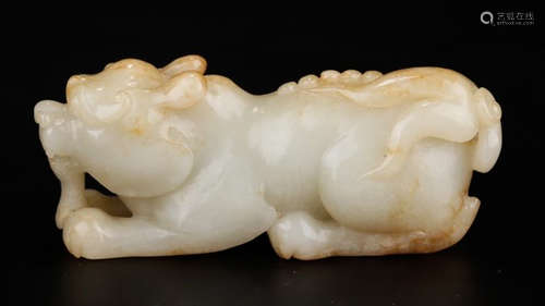 A HETIAN WHITE JADE BEAST PENDANT