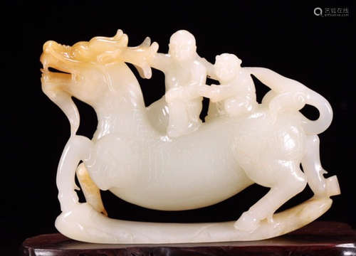 A HETIAN JADE QILIN PENDANT