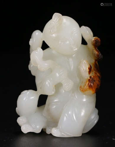 A HETIAN JADE FIGURE PENDANT