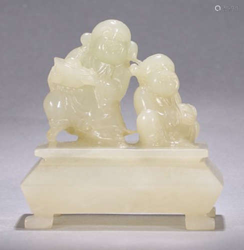 A HETIAN JADE FIGURE PENDANT