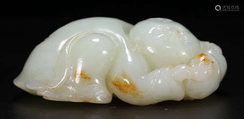 A HETIAN JADE FIGURE PENDANT