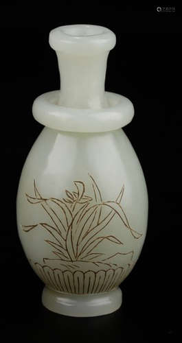 A HETIAN WHITE JADE VASE CARVED WITH ORCHID