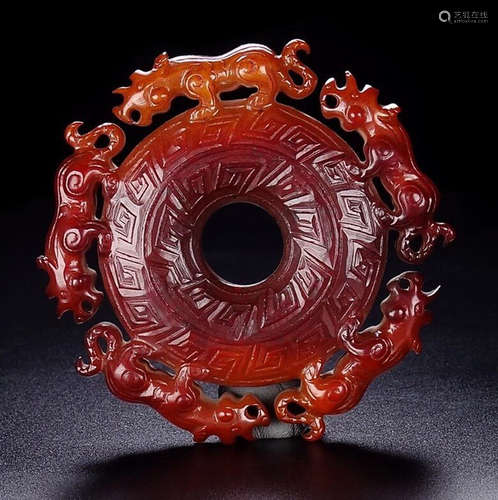 AN ANTIQUE JADE BI CARVED WITH BEAST