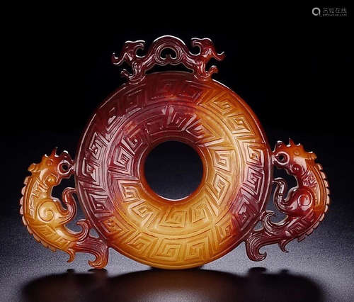 AN ANTIQUE JADE BI CARVED WITH BEAST