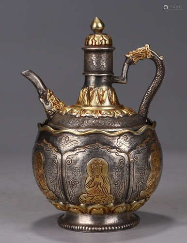 A GILT SILVER POT CARVED WITH BUDDHA