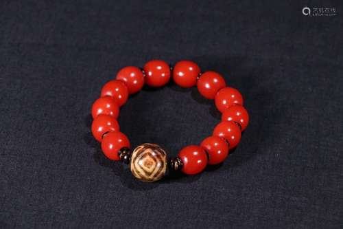 An Agate Bracelet With Dzi