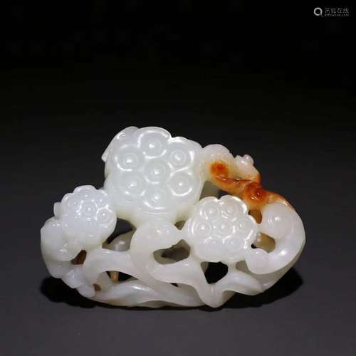 A Hetian Jade Lotus Carving Hand Piece