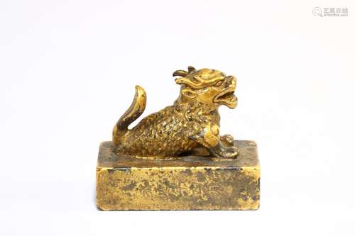 A Gilt Bronze Beast Button Seal