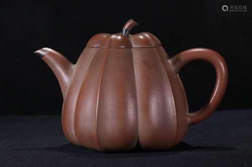 A Zisha Teapot Of Melon Shaped