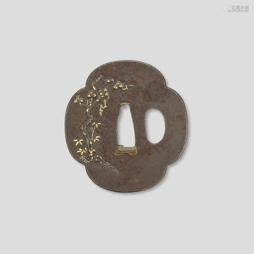 After Ishiguro Masaaki (1815-1875) An iron and mixed-metal tsuba Edo period (1615-1868), 19th century