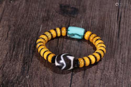 A Tibetan Amber Dzi Bracelet