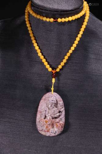 A Tibetan Dzi Amber Necklace