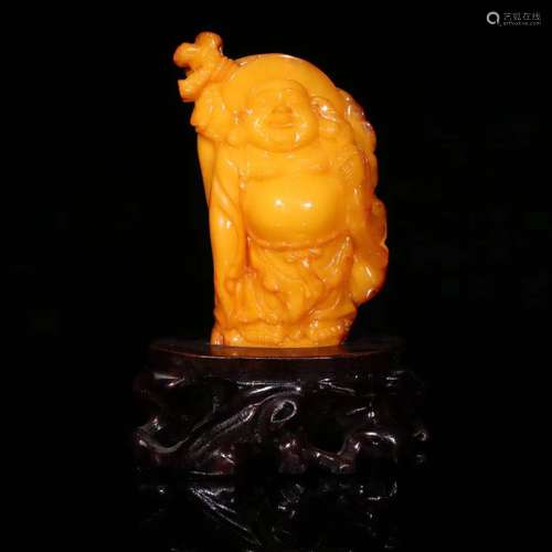 An Amber Maitreya Ornament