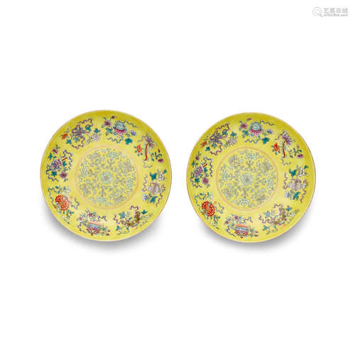 A pair of polychrome enameled yellow ground dishes Tongzhi marks