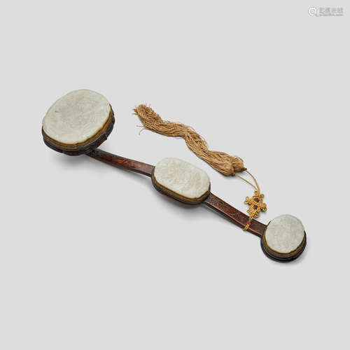 A jade mounted wood ruyi scepter