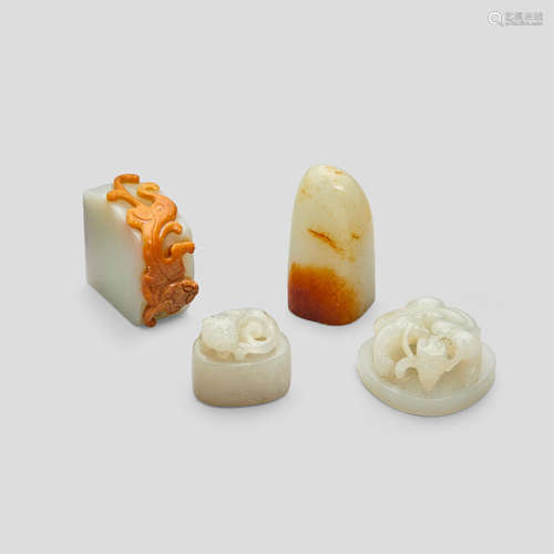 Three jade seals and a white jade finial