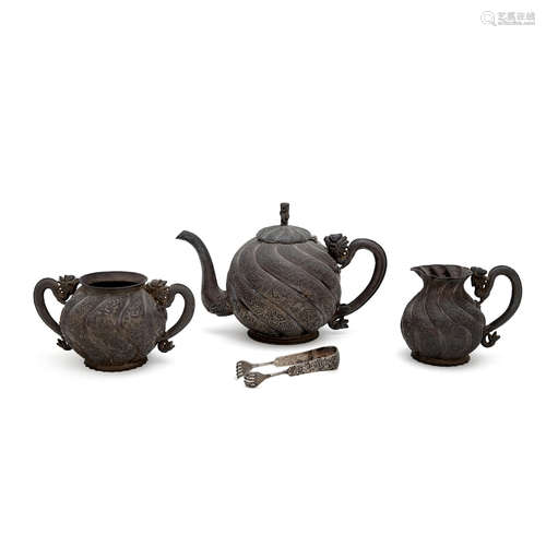 A three-piece chinese export silver tea service with dragon handles circa 1900