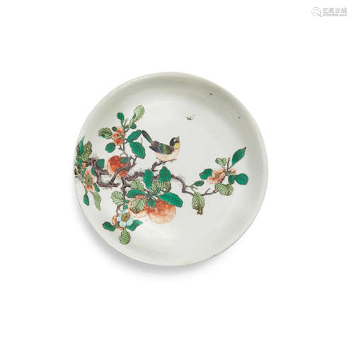 A rare famille-verte 'bird and blossoming fruit branch' saucer dish 18th century