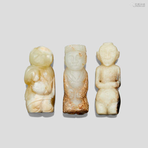 A group of three Han style jade figures