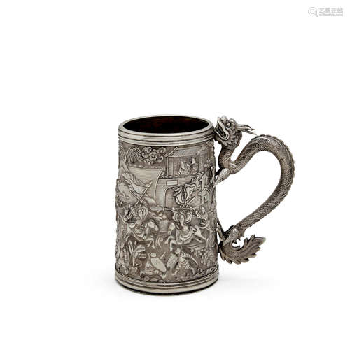 A Chinese export silver mug decorated with a war scene circa 1890