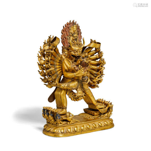 an elaborate gilt metal alloy standing figure of Vajrabhairava with consort