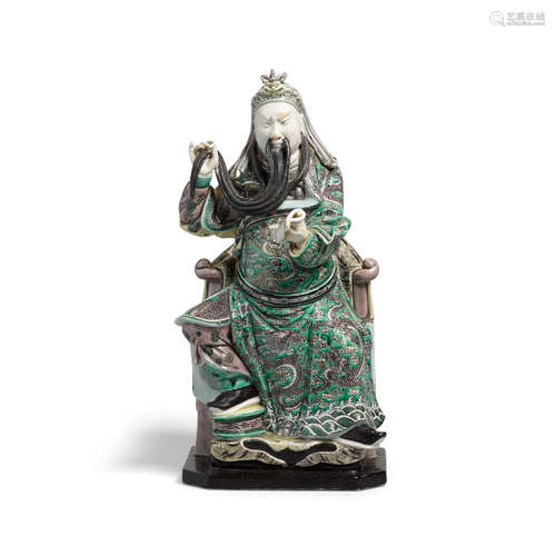 A FAMILLE VERTE ENAMELED PORCELAIN FIGURE OF GUAN YU Kangxi