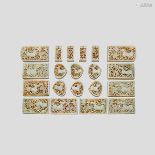 A set of twenty jin-style white jade belt plaques 20th century