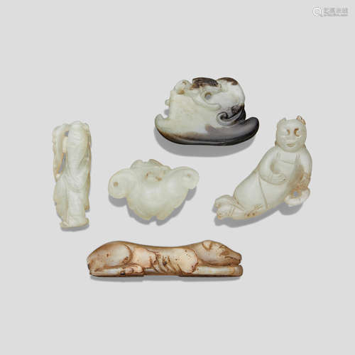 A group of five small carved jade decorations